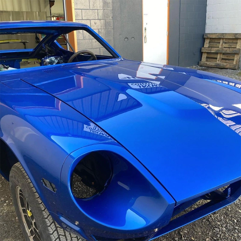 Freshly painted blue car exterior