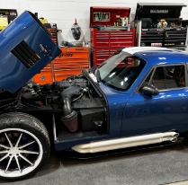 Engine restoration on a blue car